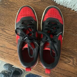 Red and Black Kids Nike sneakers